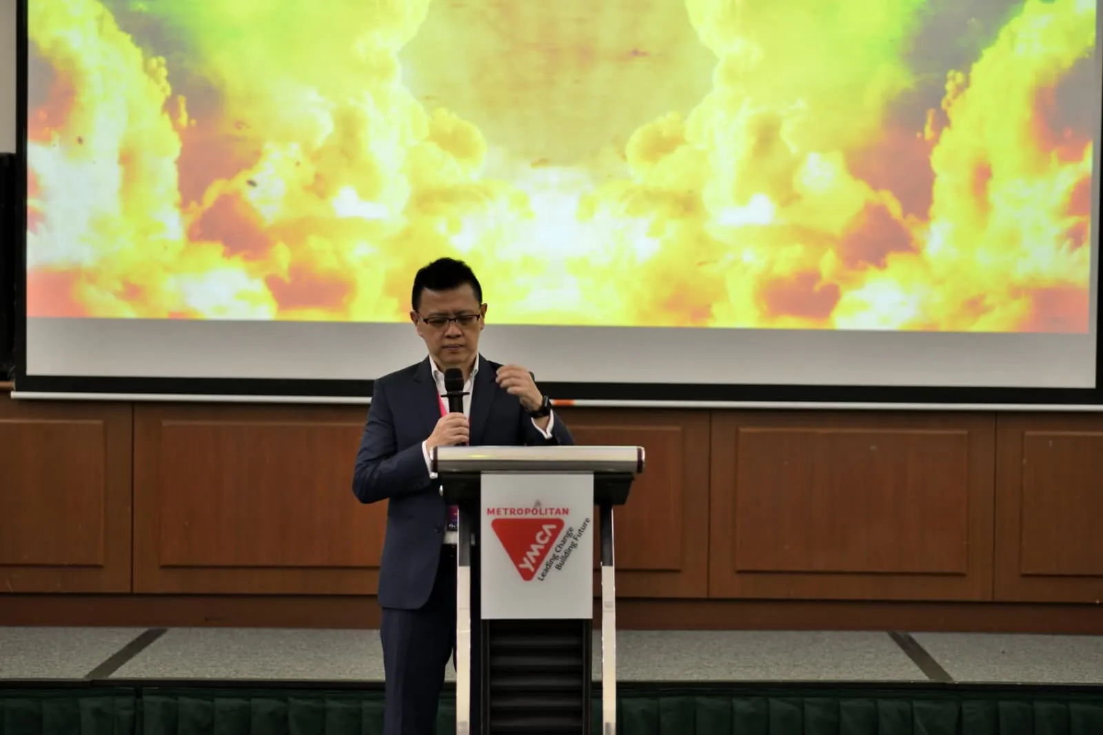 A speaker addressing the gathering