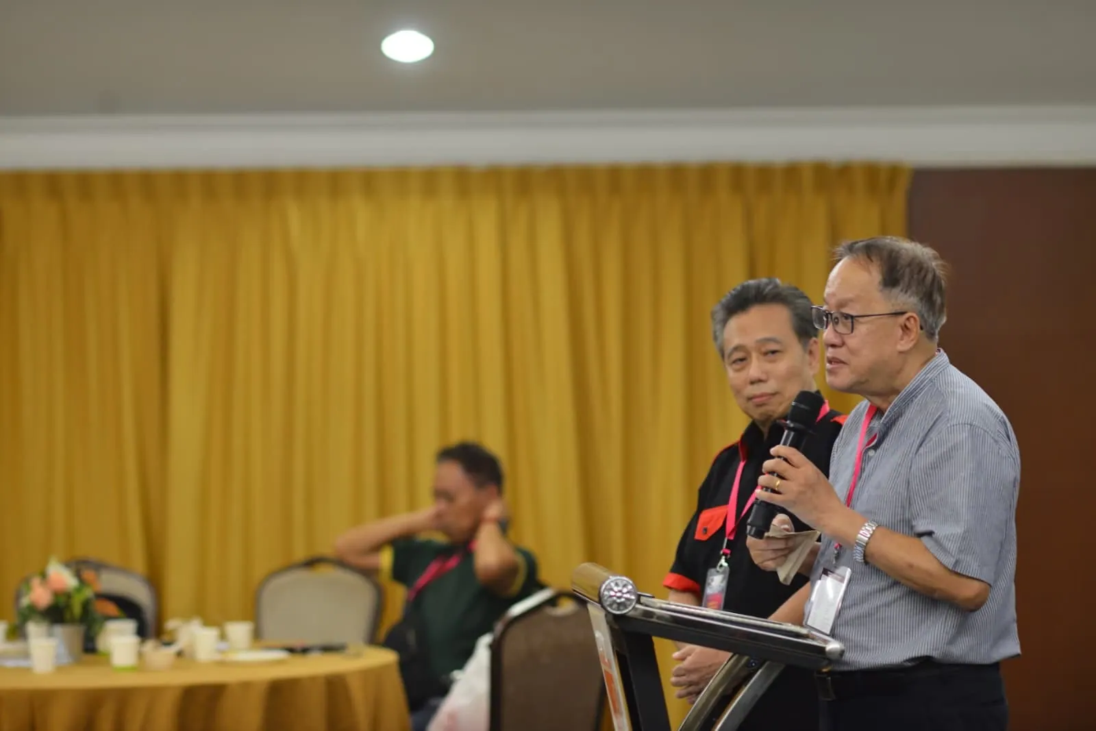 Matthias, Chapter President of FGBMFI Singapore, addressing a gathering